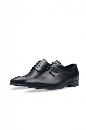 Elegant black digel shoe in perforated leather