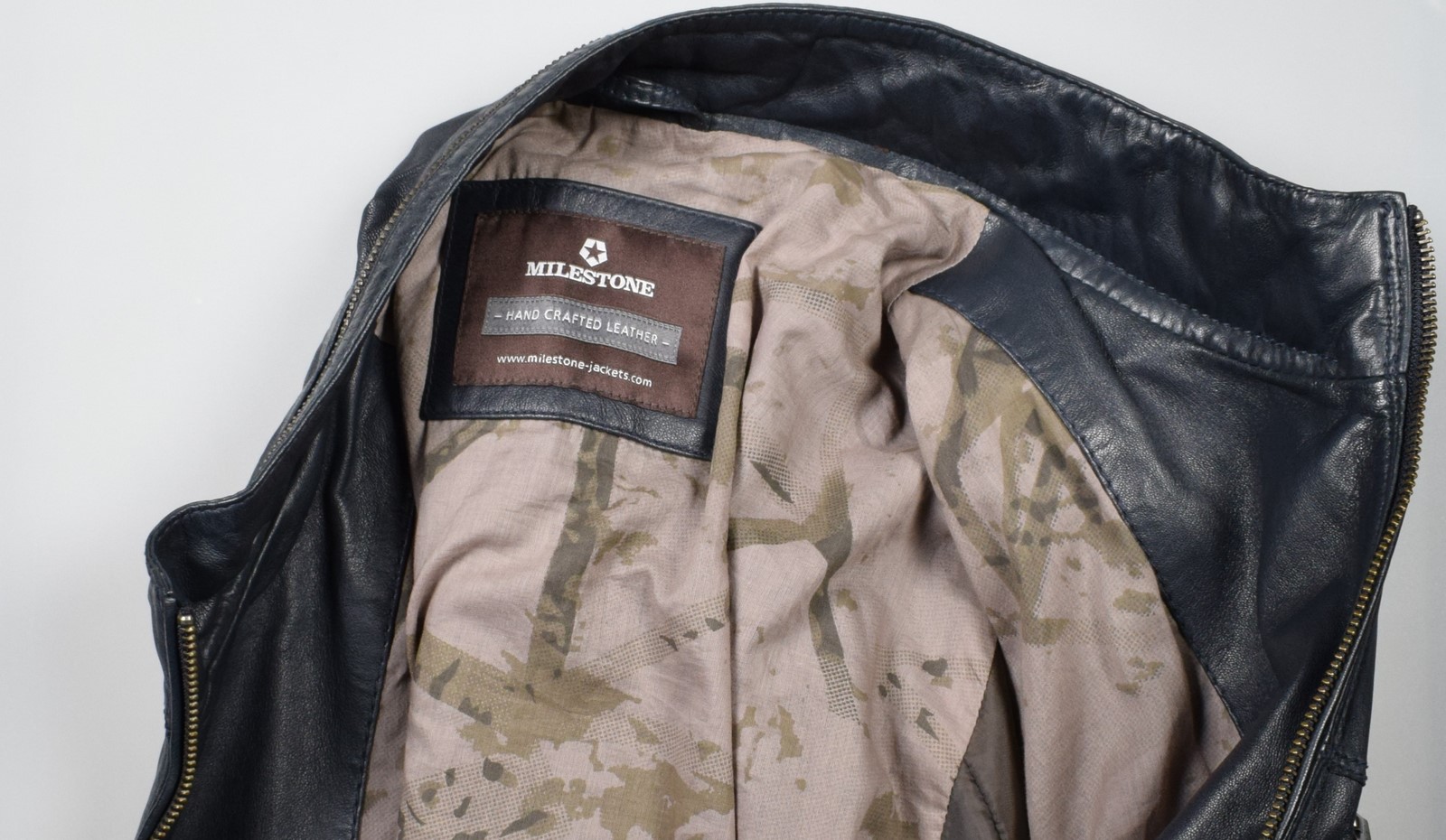 Blue leather jacket at straight bottom milestone