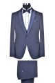 Smoking elegante baggi blu slim fit con panciotto e papillon