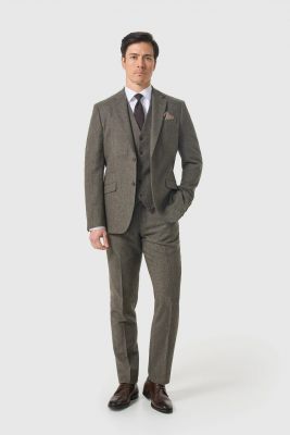 Sage green Cavani tweed suit with waistcoat
